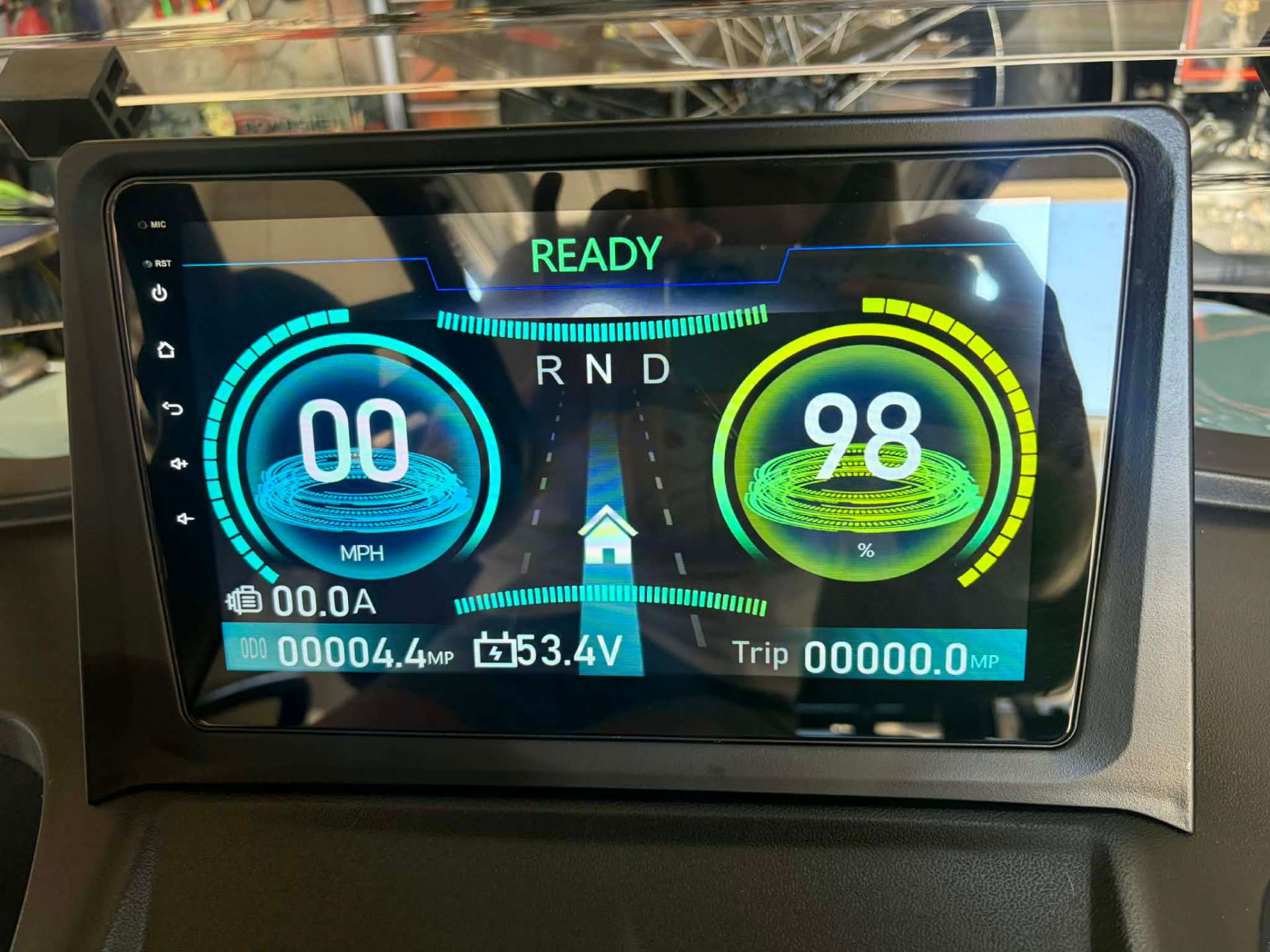 Golf cart dashboard display showing READY status and full battery